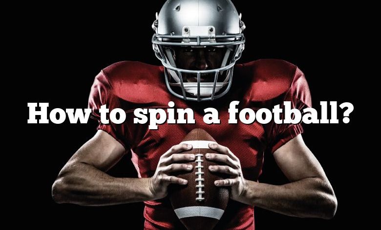 How to spin a football?