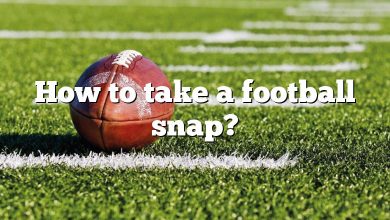 How to take a football snap?