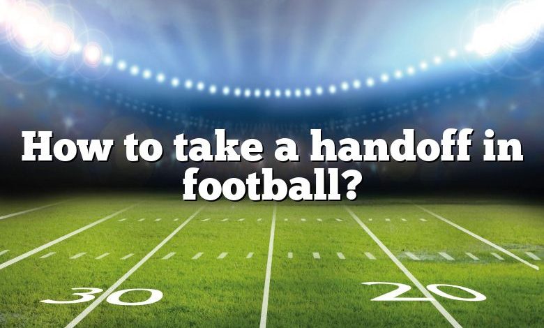 How to take a handoff in football?