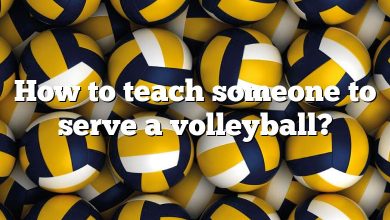 How to teach someone to serve a volleyball?