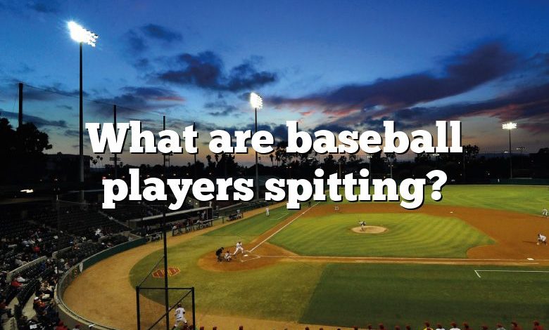 What are baseball players spitting?