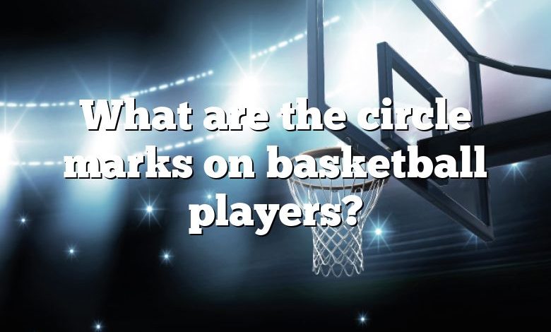 What are the circle marks on basketball players?