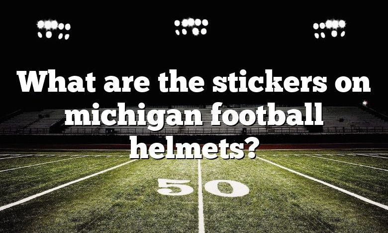 What are the stickers on michigan football helmets?