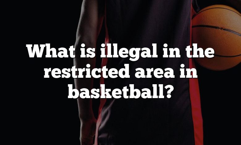 What is illegal in the restricted area in basketball?