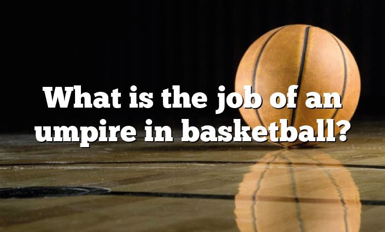 What is the job of an umpire in basketball?