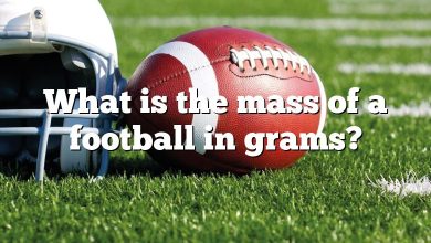 What is the mass of a football in grams?