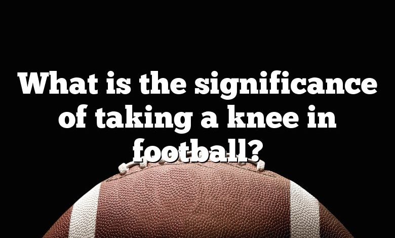 What is the significance of taking a knee in football?