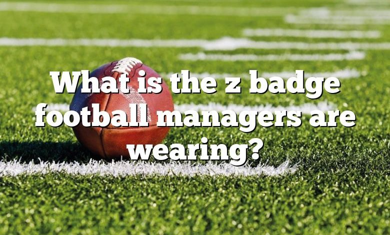 What is the z badge football managers are wearing?