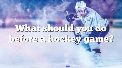 What should you do before a hockey game?