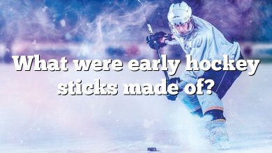 What were early hockey sticks made of?