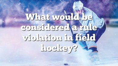 What would be considered a rule violation in field hockey?