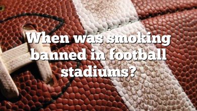 When was smoking banned in football stadiums?