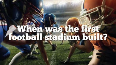 When was the first football stadium built?