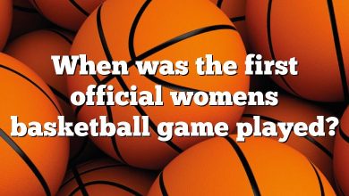 When was the first official womens basketball game played?