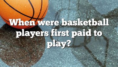 When were basketball players first paid to play?