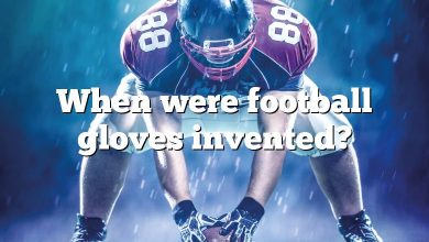When were football gloves invented?