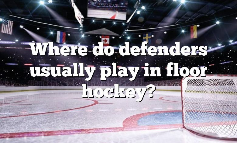 Where do defenders usually play in floor hockey?