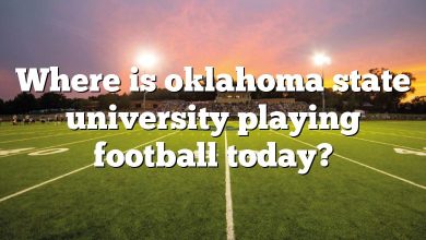 Where is oklahoma state university playing football today?