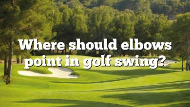 Where should elbows point in golf swing?