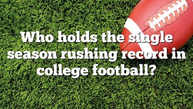 Who holds the single season rushing record in college football?