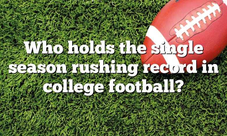 Who holds the single season rushing record in college football?