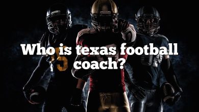 Who is texas football coach?