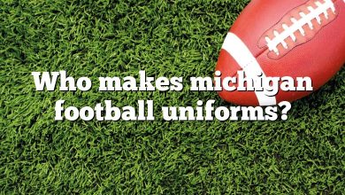 Who makes michigan football uniforms?