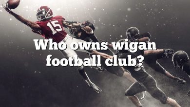 Who owns wigan football club?