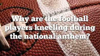 Why are the football players kneeling during the national anthem?