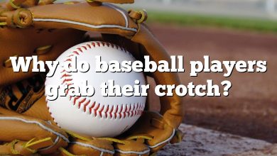Why do baseball players grab their crotch?