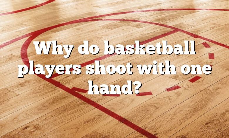 Why do basketball players shoot with one hand?