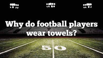 Why do football players wear towels?