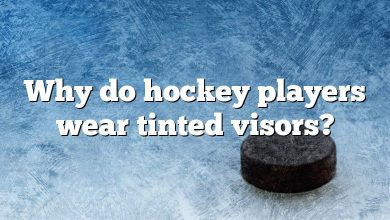 Why do hockey players wear tinted visors?