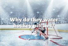 Why do they water hockey pitches?