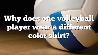 Why does one volleyball player wear a different color shirt?