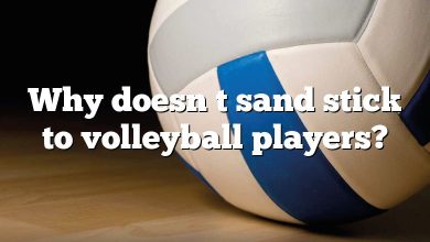 Why doesn t sand stick to volleyball players?