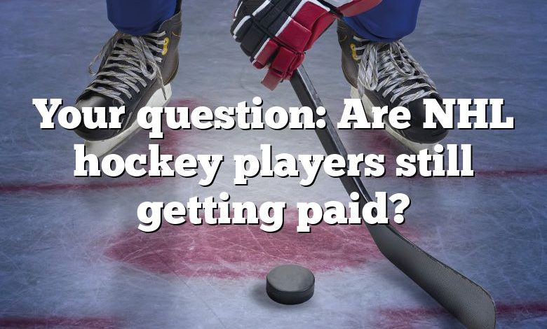 Your question: Are NHL hockey players still getting paid?